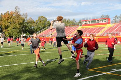 Colin Hanley ’18 jumps up for a completion during a game of ultimate frisbee.
