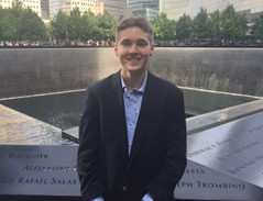Chaminade student Brett Mulitz ‘16 stands in front of the World Trade Center memorial fountains.