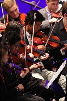 Matt Tsang ’18 plays the violin plays alongside classmate, Matt Chang ’17 and musicians from University of Dayton.