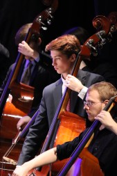 Brendan Finnerty ’16 plays the standing bass along with classmates and Dayton performers. 