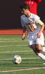Nicholas Lavinio ’16 is gaining control of the ball, with no interference from opponents.