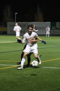 Nick Lavinio '16 gains possession of the ball from St. Anthony's.