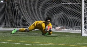 Goalkeeper Yanni Rigos '17 makes ones of many saves in the NSCHSAA Finals.