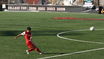 Kevin Lee ‘16 launches a pass downfield to teammates.