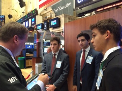 Mr. Mr. Thomas McCauley speaks to (l.-r.) Anthony Sikorski ’16, Peter Charalambous ’16, and Quinn Matos ’16.