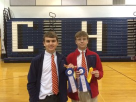Brothers Thomas Graham ’16 (l.) and Joseph Graham ’17 (r.) proudly display their first place medals in Robot Arm.