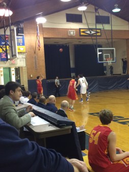 Quinn Suydam ’16 takes a shot from the outside in hopes of getting a three-pointer.
