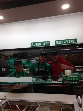 Some of the employees of Burrito Blvd. gather behind the counter for a mid-shift photo.
