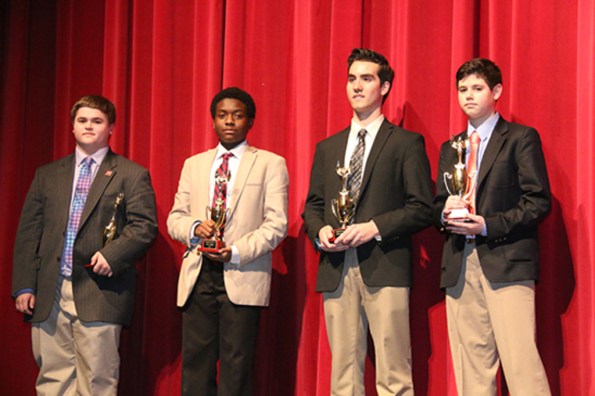 (l-r.) Joseph Moses ’19, Kenneth Bradley ’18, Michael Carolan ’17, and Walter Szech ’18, show off their trophies after receiving highest honors in their respective categories. 