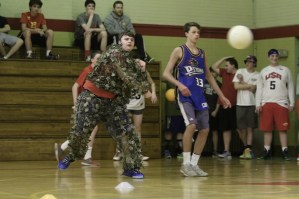 Now you see him: Joe Jansen 3F lobs a ball dressed in his ghillie suit.