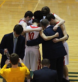 Coach Paul motivates the team during the game.