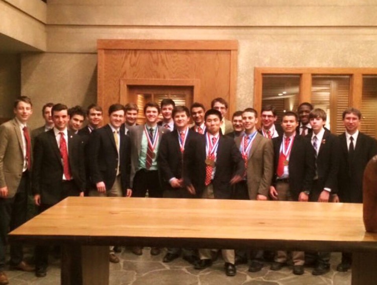 After finishing with eighth place at the state competition, the Flyers pose for a photo to immortalize their exceptional performance.