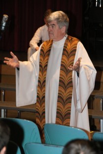 Fr. Garrett speaks to the students gathered about recognizing Christ in their lives, especially during the Easter season.