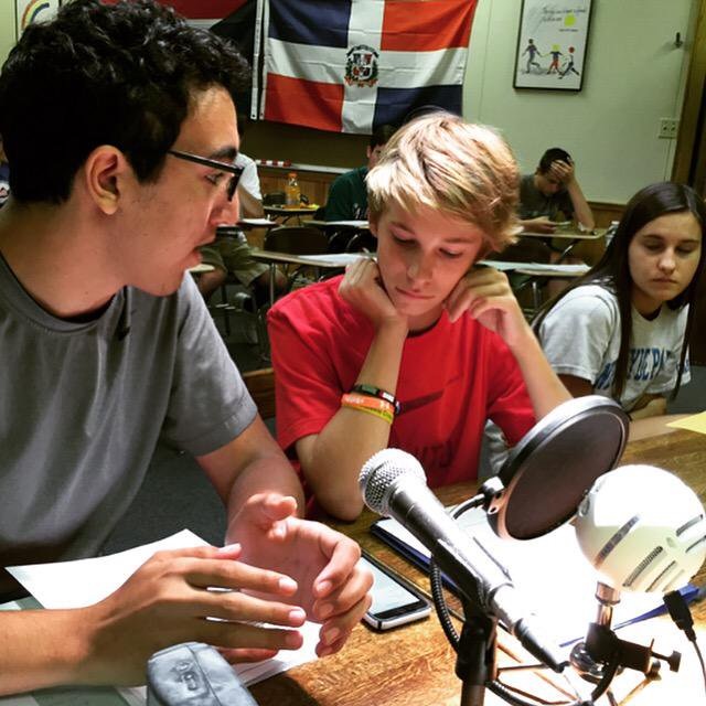 Using the genuine tools of the trade, campers practice broadcasting sporting events. 