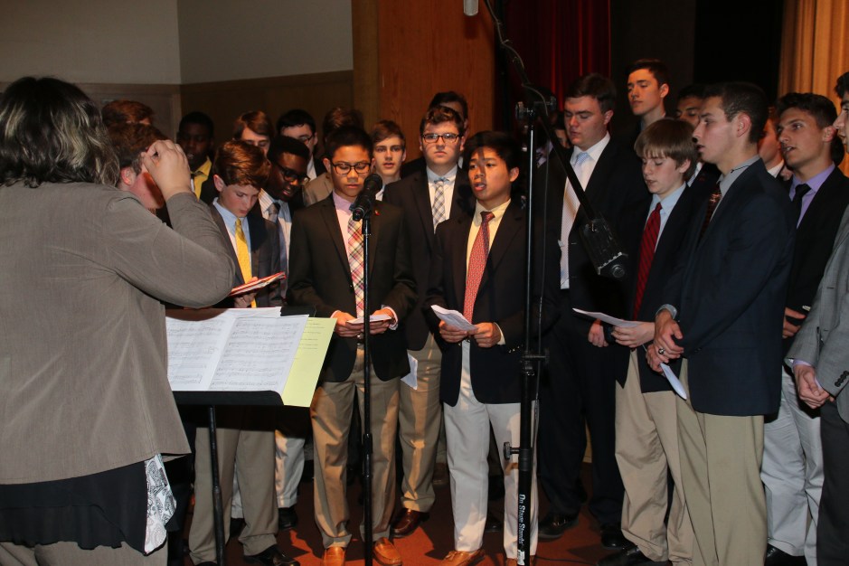 Members of the Glee Club sing at Sodality Prayer Service.