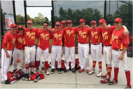 Seniors pose for a picture with walk-off hero Joe Suozzi ‘16, #4, after the big win.