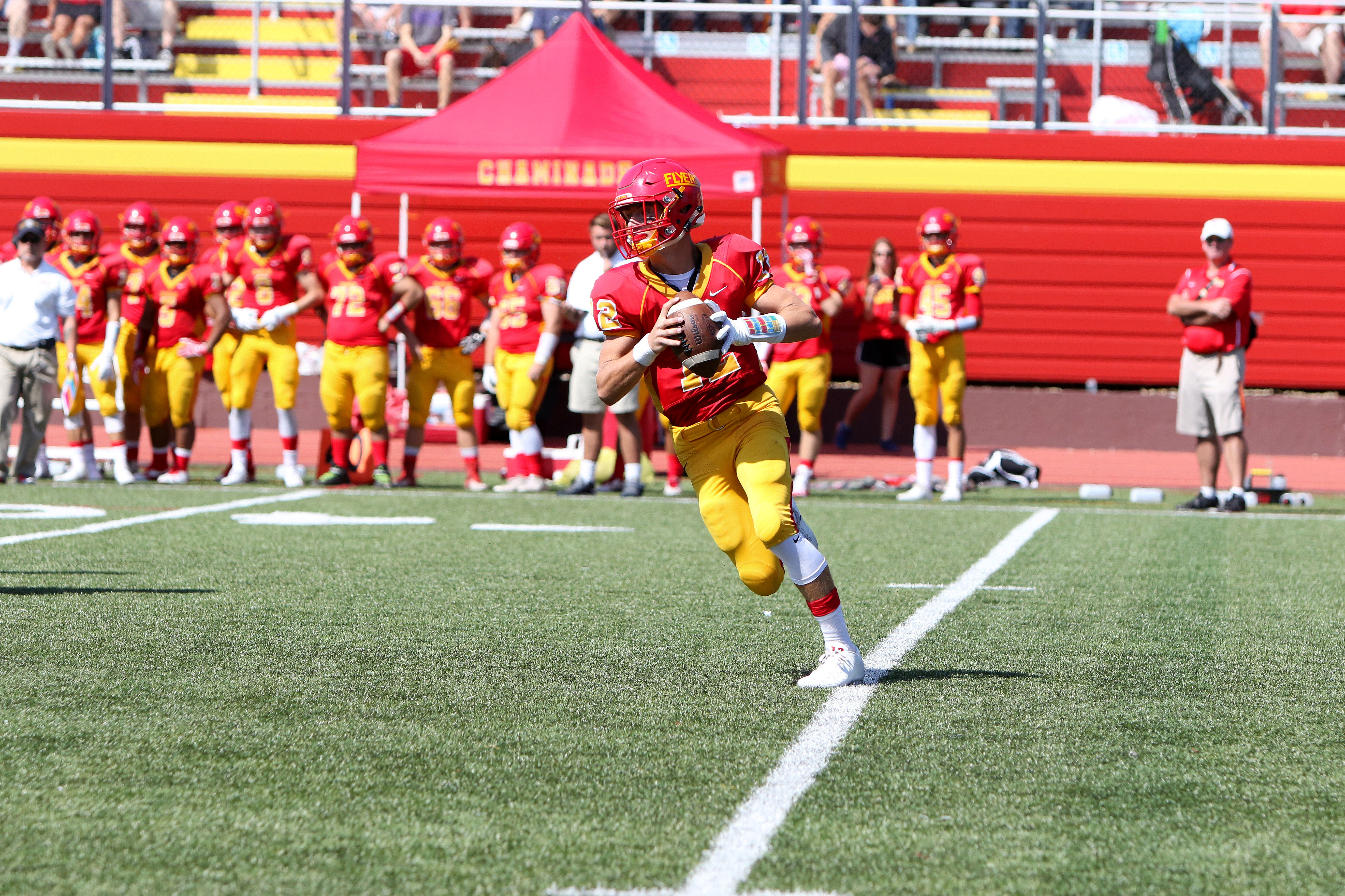 Quaterback Matt Chmil '17 prepares to launch a pass to his teammate.