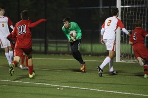 Andrew Hammersly ’19 makes a save to stop the Cougars’ offensive in the semi-finals.