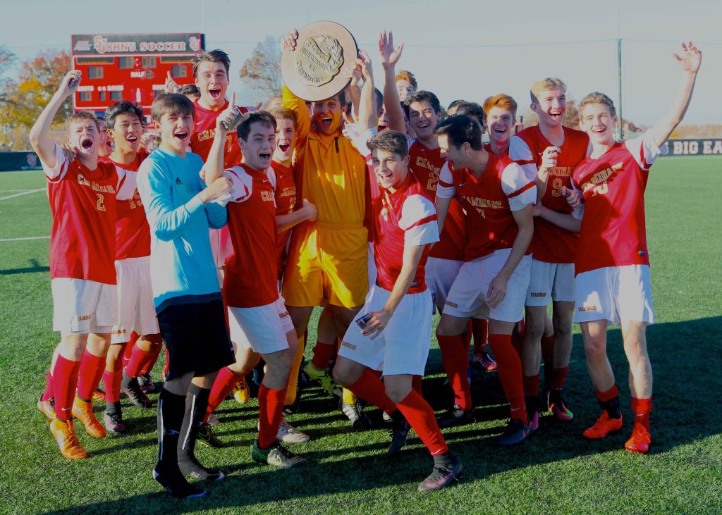 Elated after capturing Chaminade’s sixth state title, the Flyers celebrate with candor. Photo Credit: Geoff Walter '01. 