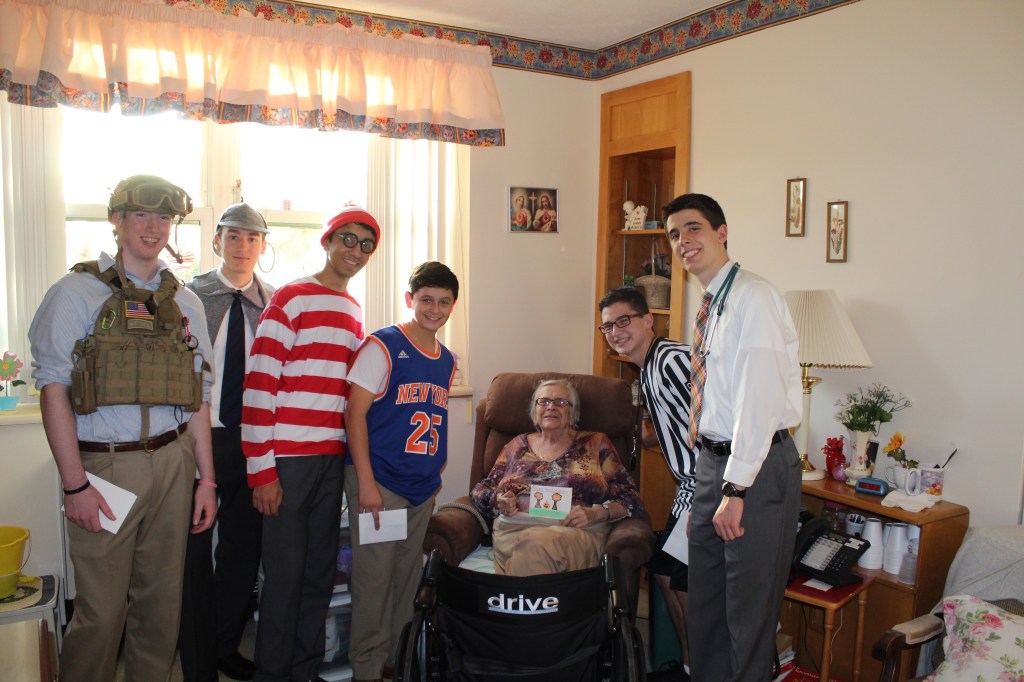 Nothing Scary About These Volunteers: Emmaus Visits Queen of Peace Residence for&nbsp;Halloween