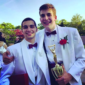 Thomas Miloscia ’15 (left) smiles with best friend Tobias Hoonhout ’15 after their graduation.