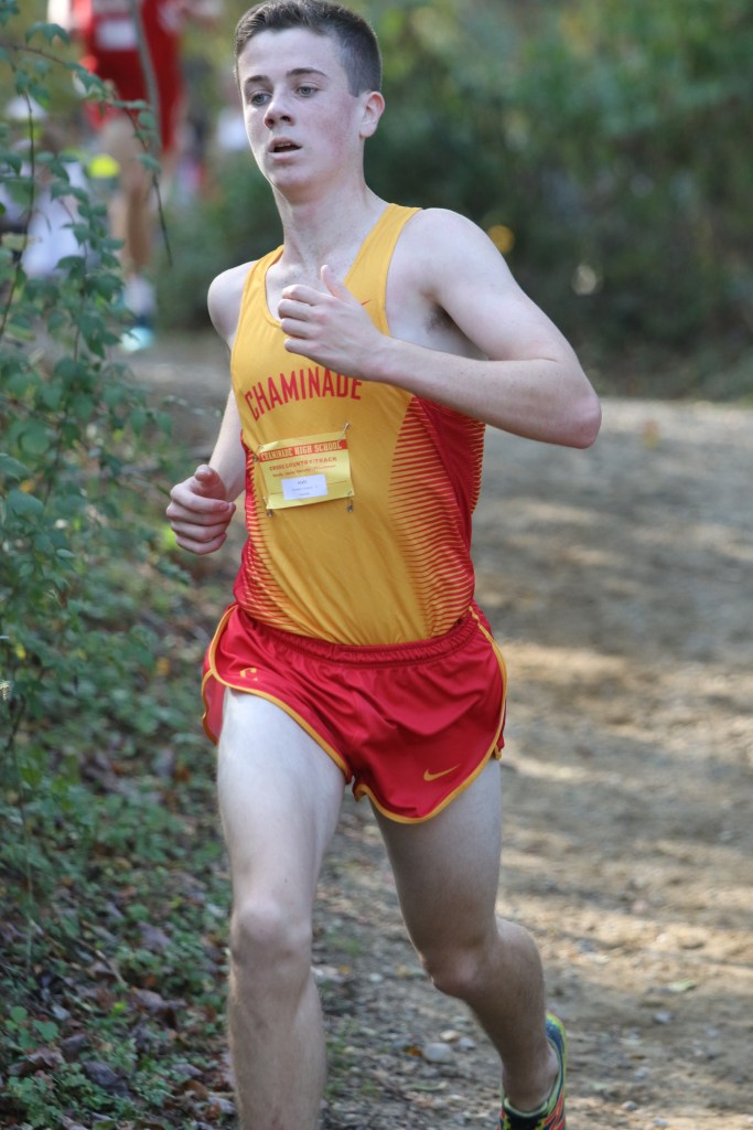 Loumeau races in the cross country varsity championship meet this past Sunday, October 31.