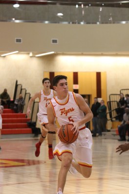 Michael O’Connell ’20 attacks the basket.