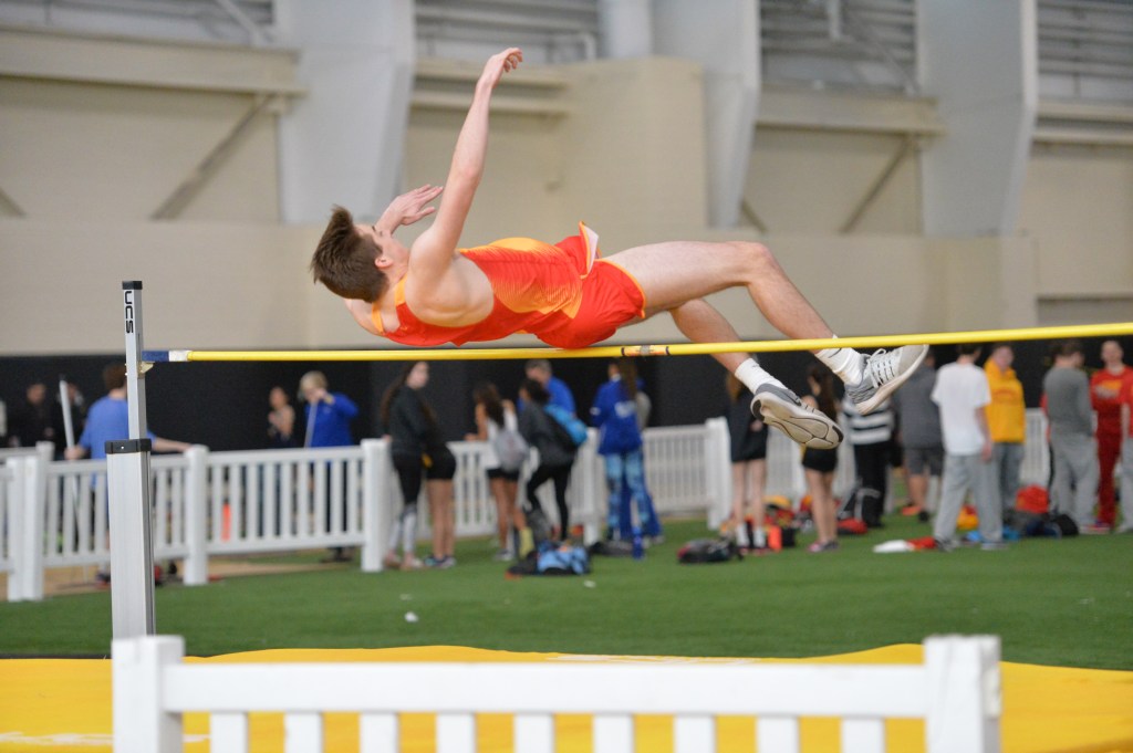 In the high jump, John Luke Hoonhout ‘17 propels himself with excellent form. 