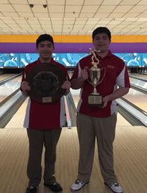 Marcus Alaimo ‘20 (left) and James Alaimo ‘18 (right) pose with the team’s trophy and plaque.