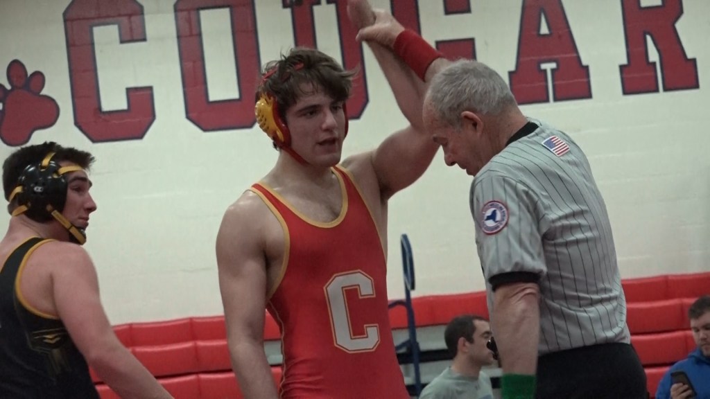 Ted Flaherty ’17 is proclaimed the victor of his match. 