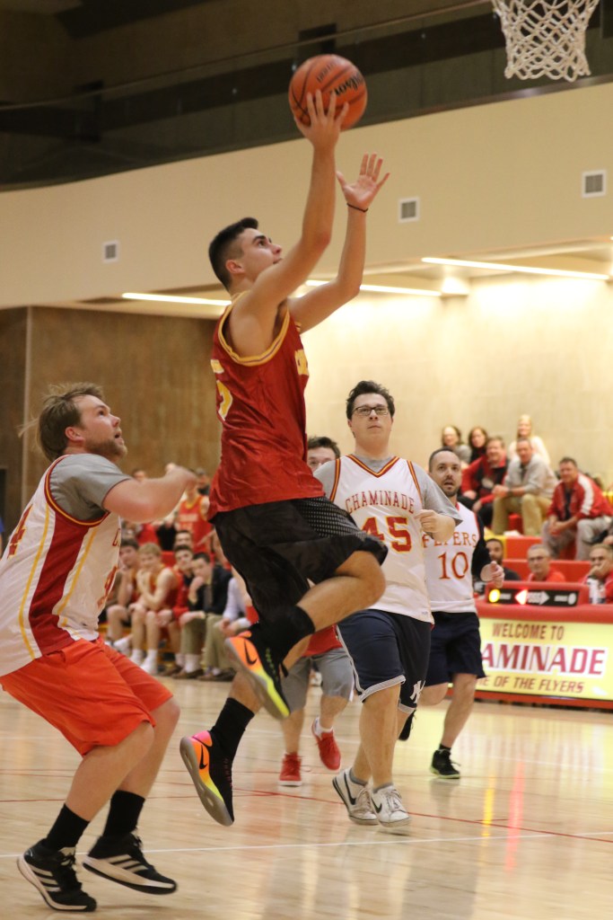 Senior Francesco Maropakis goes for one of his many layups in the final game against the teachers